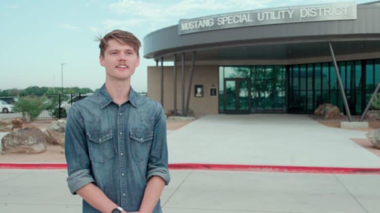 Michael Blake of Specific Energy stand outside Mustad Special Utility District.